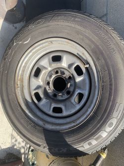 14” Chevy Rim And Tire  Black Wall