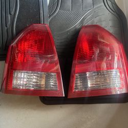 (1 Review) 2005-2007 Chrysler 300 Tail Light Driver Left and Passenger Right Side