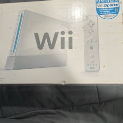 Wii With Games And Remotes 