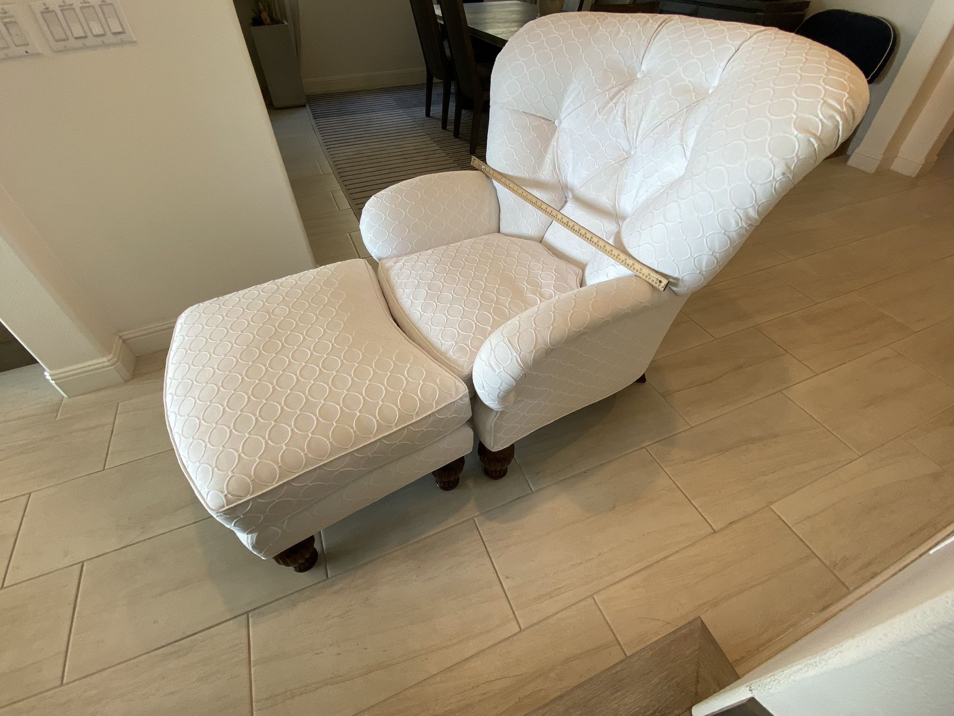 White chair and ottoman