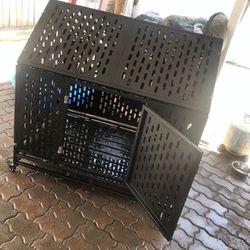LARGE METAL  DOG HOUSE WITH WHEELS AND DOOR