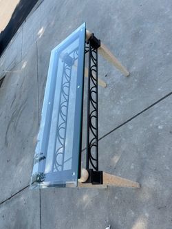 Glass table  with Wrought Iron Bracket