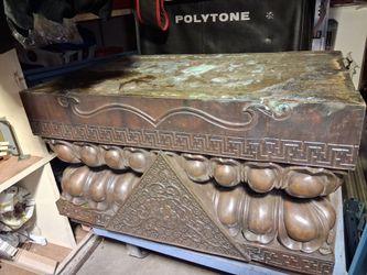 Chinese-style lotus pedestal, likely made of bronze or a heavy copper alloy