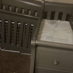 crib and changing station for baby