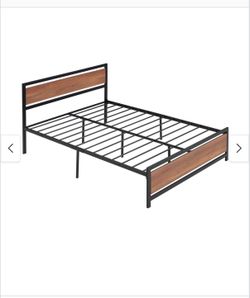 Metal Queen bedframe complete with slats! No Box Spring Needed!!