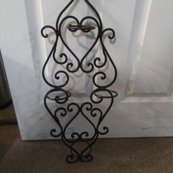    (  Wall Hanging Wine Rack.)  NEW NEVER USED.   LETTING  IT GO FOR $35.00 Firm.  Purchased New For Much More. Holds Four Bottles Wine . Beautiful.