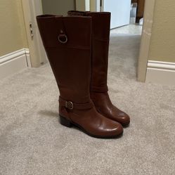 Stylish and classic brown knee-high boots 