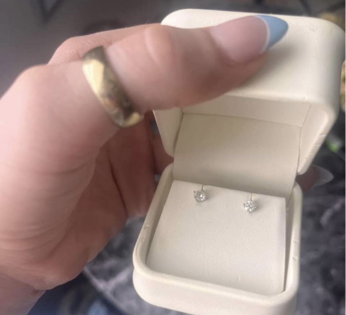 14 karat natural gold pierced friction. round brilliant cut natural mined diamonds.