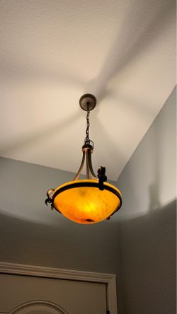 Very nice metal and glass hanging light.