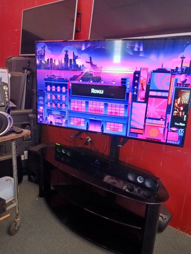 Tv And Sound Bar And TV Stand