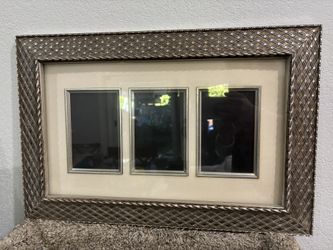 Beautiful Picture Frame holds three 4 x 6 photos and measures  at 20 1/2 X13 1/2 $20