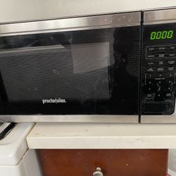 Proctor Silex 1.1 cu ft. capacity 1000 Watt of Power Microwave Oven , Stainless