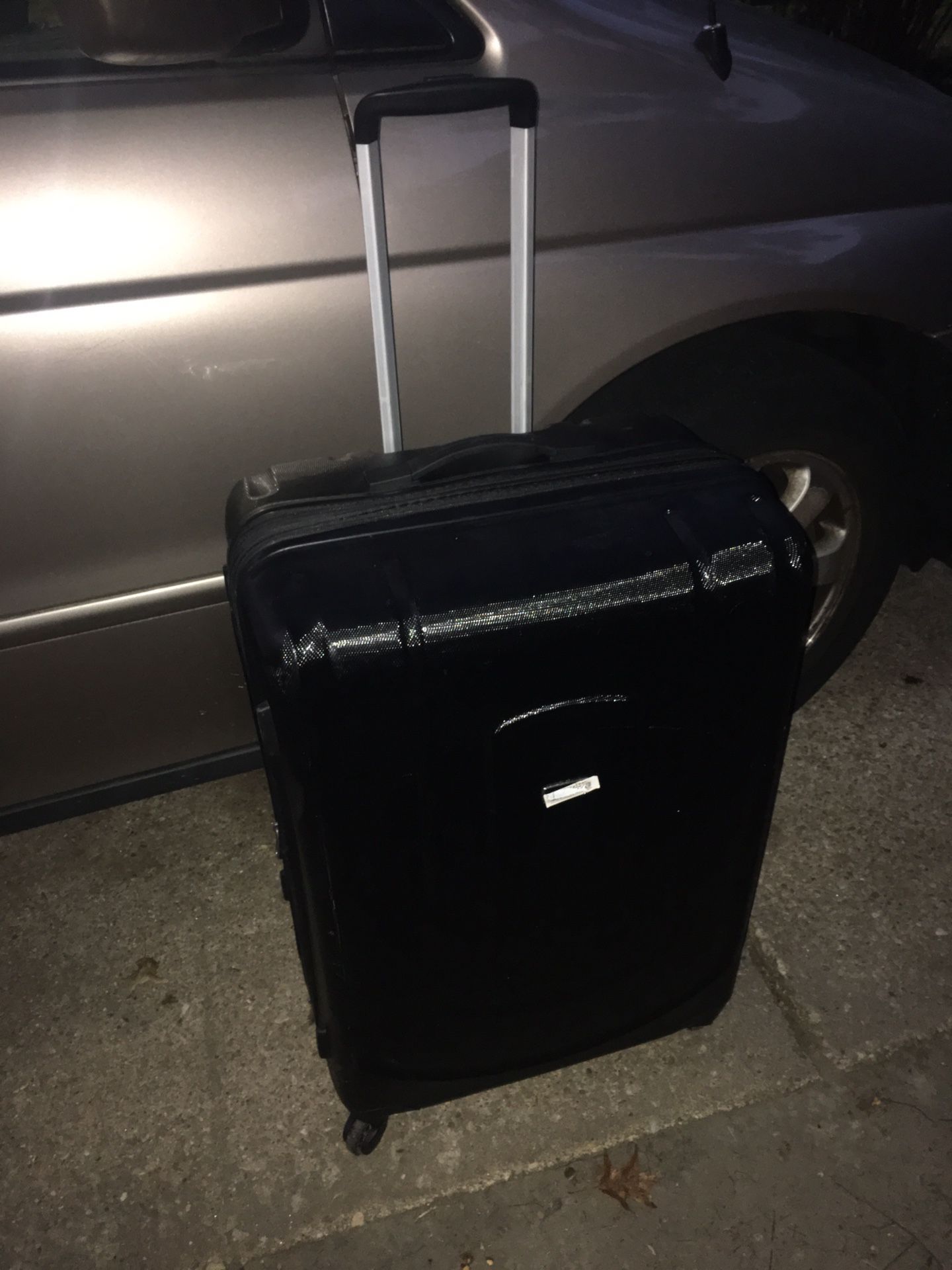 Nice Large hard shell four wheel suitcase with handle only $40 firm
