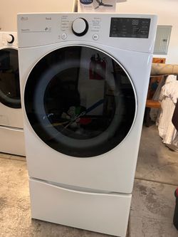LG ThinQ Washer and Dryer Set With Risers