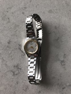 Carvelle Quartz Silver with Gold Woman’s Watch