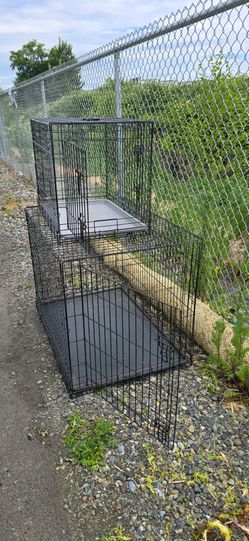 Two animal cages