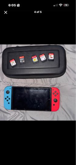 Nintendo Switch with Carrying Case and 5 Games