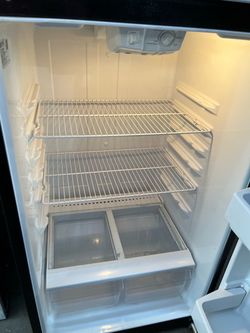Refrigerator with Wire Shelves and Crisper Drawers