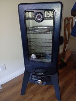 Pit Boss Blue Blazing 3 series Analog Electric Upright Smoker.