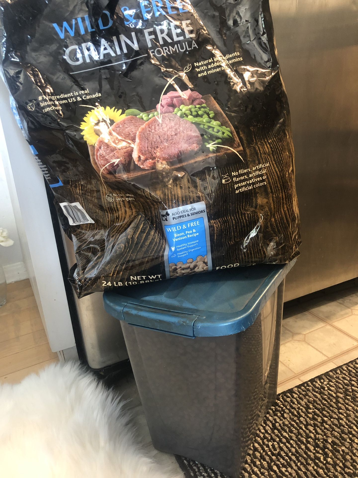 Half bag of grain free premium dog food.