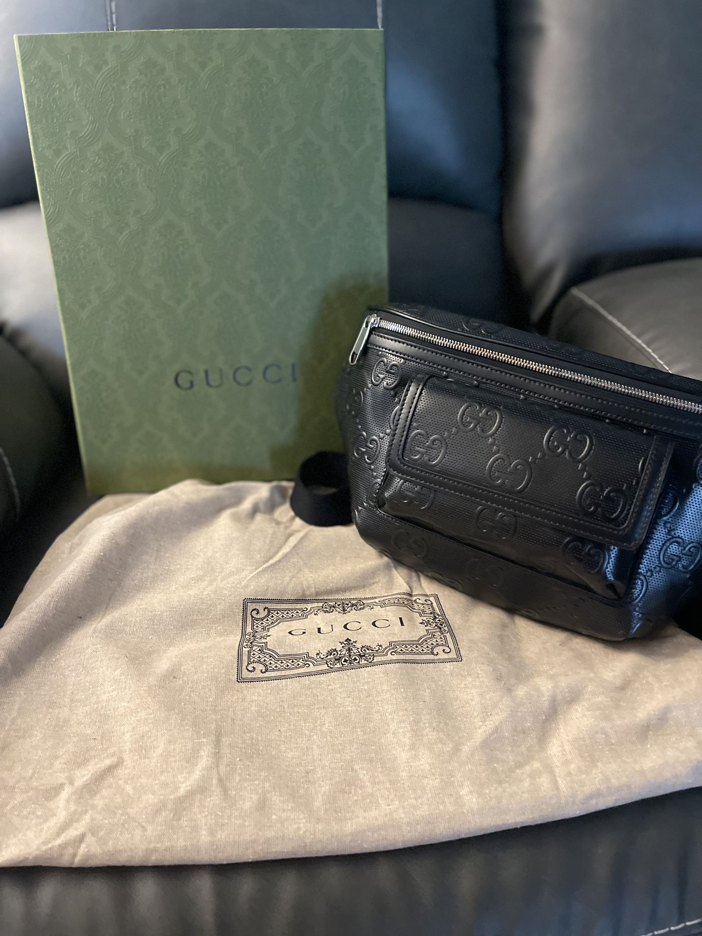Gucci - GG embossed belt Bag
