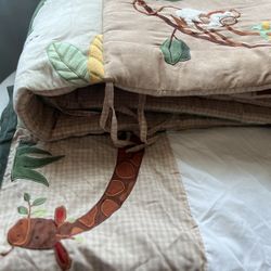 Safari themed baby sheet and crib bumper
