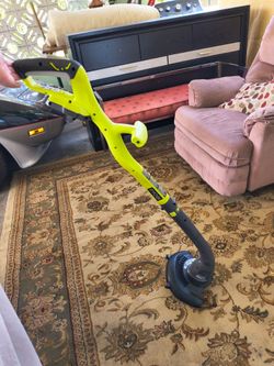 Electric battery powered Ryobi weed eater and edger combo