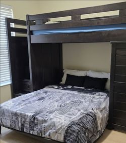 Bunk bed with storage and cabinets