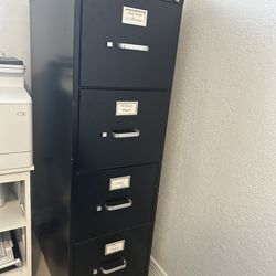 Black Metal File Cabinet. 