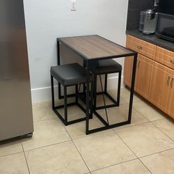 Tall table with stools