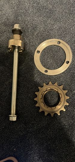 Razor 10 inch wheel chrome rim plus axle and sprocket comes in box