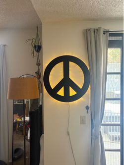 Peace sign wall light