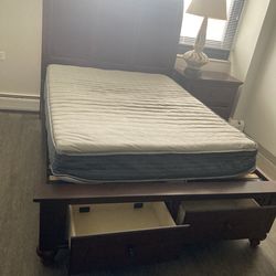 Like new full size wooden  platform storage bed with a free mattress