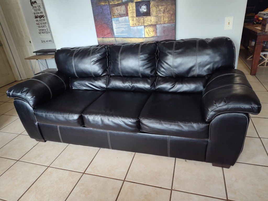 Leather Loveseat And Sofa. 