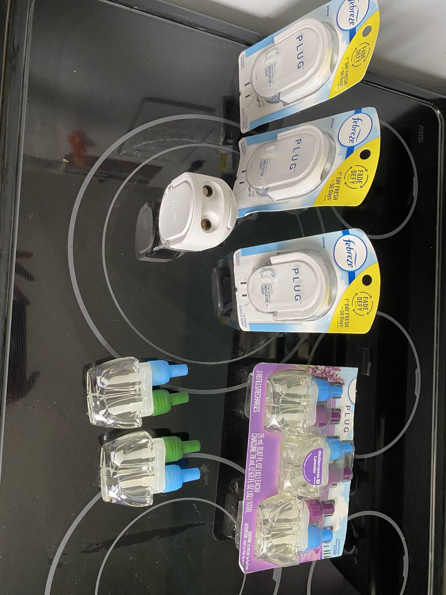 Febreeze Plug Ins And Refills/Ozium Spray
