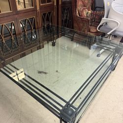 HUGE vintage-style coffee table features a black metal or wrought iron base w/a clear glass top - Originally $2800