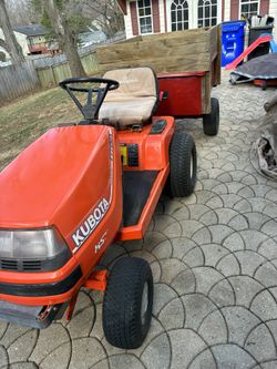 Kubota oHV T1700X 54” CUT RIDING MOWER WITH DUMP CART. 