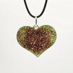 Comet Heart Orgonite Pendant, Provides EMF Protection, And  Emotional Balance.


Contains:

Fuchsite, Copper, and resin.


Introducing our exquisite o