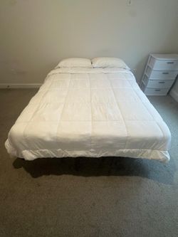 Clean queen bed with frame