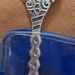 This souvenir spoon showcases a beautiful scene of Lucerne, Switzerland and is made of silverplate.
