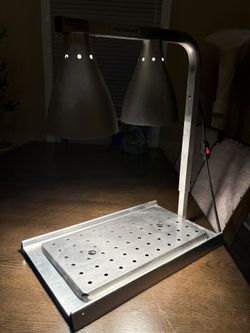Commercial Merco twin head aluminum food heat lamp. Works great!!! 