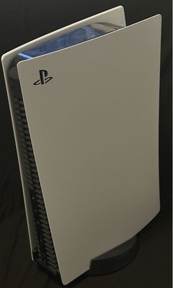 PS5 Disc Edition bundle with 2 DualSense controllers + dual charging station + cables.