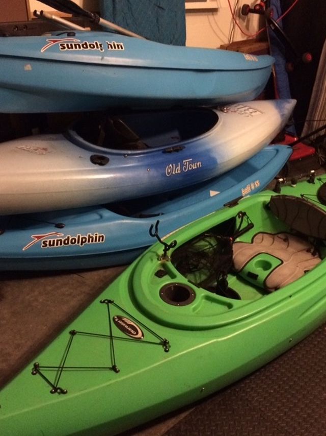 4 Kayaks W/paddles.