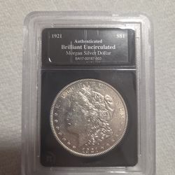 1921 $1 Morgan Silver

Dollar in Brilliant

Uncirculated Condition (CASH ONLY)