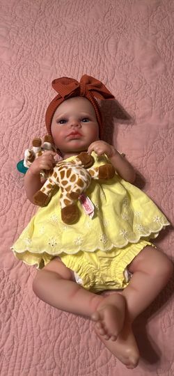 Realistic baby doll