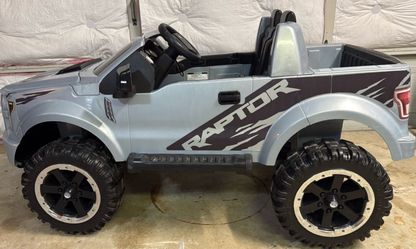 Power Wheels Ford Raptor Kids Ride-On Truck