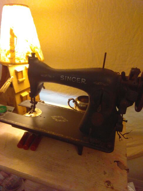 Old worn down Singer sewing machine
