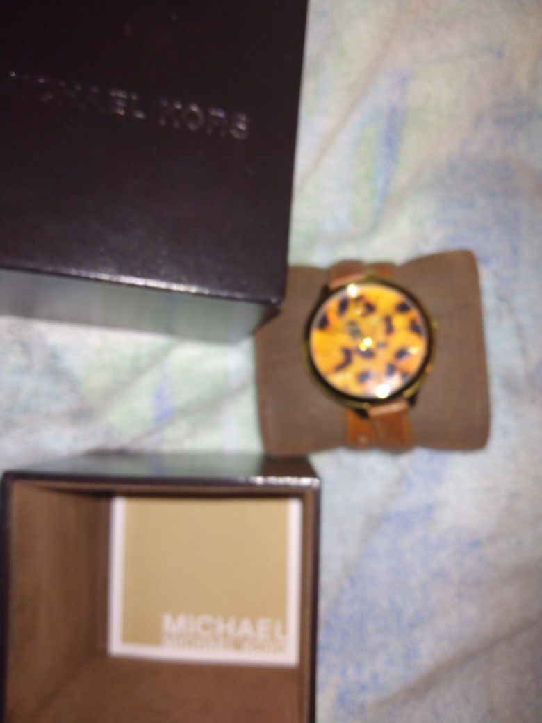 Women's. Michael Kors. Double Wrap Around Strap Wristwatch.  Never Used. Just Needs Batteries. $20. Comes With Box. 