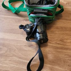 Nikon COOLPIX P90 digital camera with SD card 12 gb with carry case