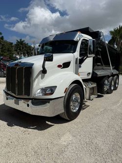 2022 PETERBILT 579 DUMP TRUCK TRI-AXLE STEEREABLE THIRD AXLE